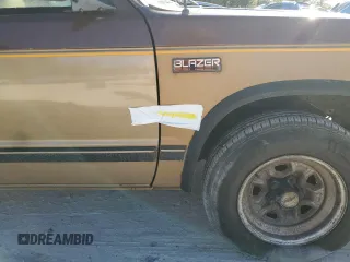1988 Chevrolet Blazer z VIN 1GNCS18R1J0106286, wystawiony jako Copart lot #76802554 z przebiegiem 190 360 mil mil oraz Szkoda całkowita • Salvage title. Historia ofert i sprzedaży dostępna na DreamBid. Obrazek 13.