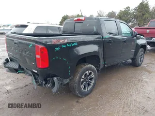 2021 Chevrolet Colorado 4WD Z71 with VIN 1GCGTDEN7M1282445, listed as a IAAI auction lot 41737419 with 27,187 mi miles and . Bid and sale history available at DreamBid. Image 4.