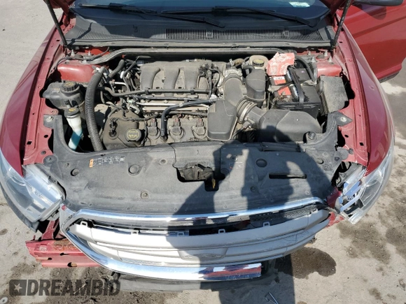 2015 Ford Taurus SEL with VIN 1FAHP2H89FG155477, listed as a Copart auction lot 49593245 with 122,448 mi miles and Salvage Title. Bid and sale history available at DreamBid. Image 12.