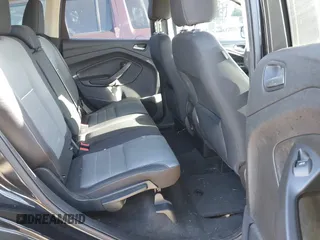 2014 Ford Escape SE with VIN 1FMCU9G9XEUB01861, listed as a IAAI auction lot 42096150 with 141,853 mi miles. Bid and sale history available at carsss.com. Image 8.