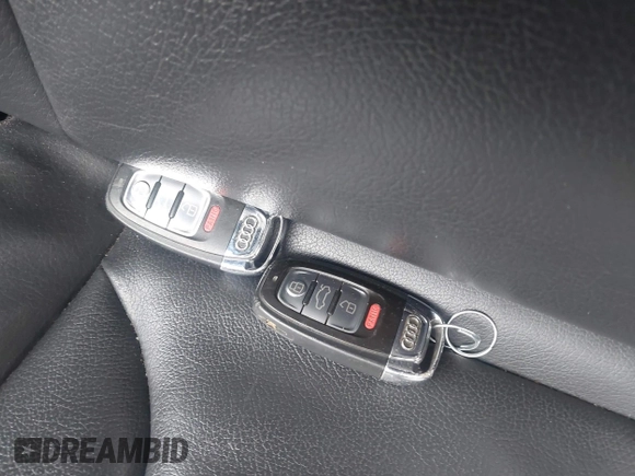 2013 Audi A4 Premium z VIN WAUAFAFL1DN033539, wystawiony jako IAAI lot #41936192 z przebiegiem 128 088 mil mil oraz . Historia ofert i sprzedaży dostępna na DreamBid. Obrazek 11.