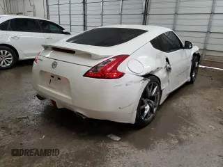 2013 Nissan 370Z Touring z VIN JN1AZ4EH5DM383466, wystawiony jako Copart lot #85704054 z przebiegiem 37 892 mil mil oraz Szkoda całkowita • Salvage title. Historia ofert i sprzedaży dostępna na DreamBid. Obrazek 3.
