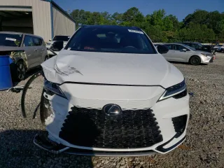 2023 Lexus RX with VIN 2T2BCMEAXPC006344, listed as a Copart auction lot 58256654 with 9,590 mi miles and Salvage Title. Bid and sale history available at carsss.com. Image 5.