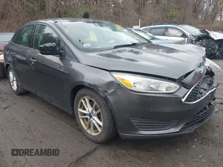 2016 Ford Focus SE z VIN 1FADP3F26GL365207, wystawiony jako IAAI lot #41986881 z przebiegiem 124 822 mil mil oraz . Historia ofert i sprzedaży dostępna na DreamBid. Obrazek 1.