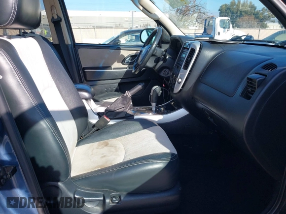 2005 Mercury Mariner Luxury z VIN 4M2CU57135DJ07230, wystawiony jako IAAI lot #41461657 z przebiegiem 267 105 mil mil oraz . Historia ofert i sprzedaży dostępna na DreamBid. Obrazek 5.