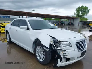 2013 Chrysler 300 with VIN 2C3CCAAG1DH712206, listed as a IAAI auction lot 42467731 with 94,639 mi miles and . Bid and sale history available at DreamBid. Image 1.