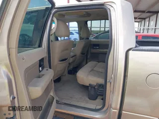 2006 Ford F-150 XLT with VIN 1FTRW12W26KD43273, listed as a IAAI auction lot 42153933 with 183,771 mi miles. Bid and sale history available at carsss.com. Image 8.