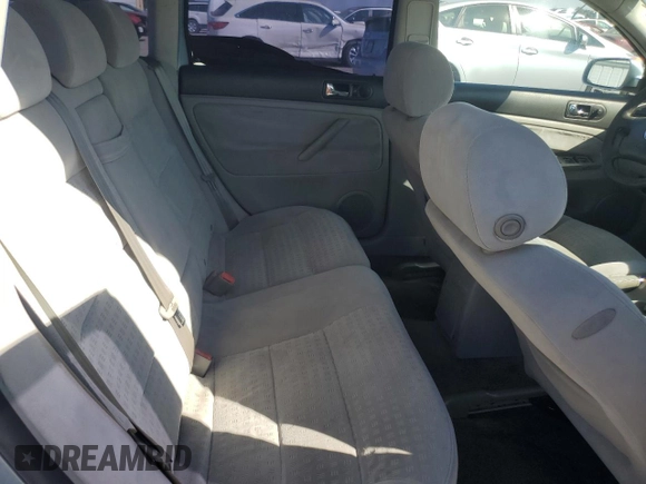 2003 Volkswagen Passat GLS z VIN WVWVD63BX3E148318, wystawiony jako Copart lot #74841944 z przebiegiem 86 620 mil mil oraz Szkoda całkowita • Salvage title. Historia ofert i sprzedaży dostępna na DreamBid. Obrazek 10.