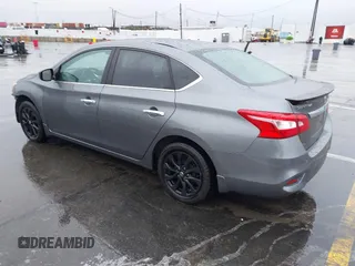2018 Nissan Sentra S with VIN 3N1AB7AP0JY244535, listed as a IAAI auction lot 41573436 with 150,919 mi miles and . Bid and sale history available at DreamBid. Image 3.