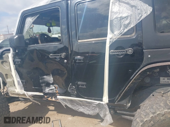 2014 Jeep Wrangler Unlimited Rubicon X with VIN 1C4HJWFG3EL274905, listed as a IAAI auction lot 41512631 with 123,961 mi miles and . Bid and sale history available at DreamBid. Image 15.
