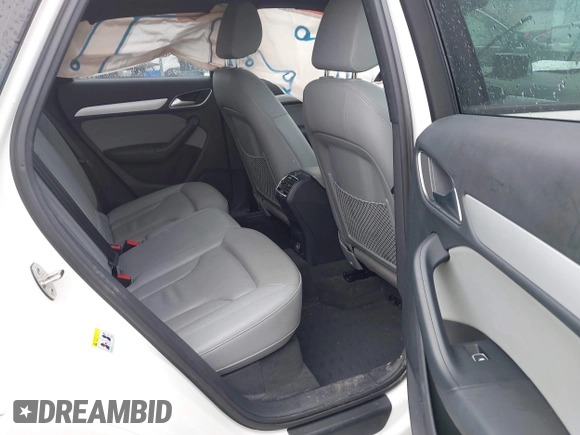2017 Audi Q3 Premium z VIN WA1BCCFS4HR016424, wystawiony jako IAAI lot #41627278 z przebiegiem 60 028 mil mil oraz . Historia ofert i sprzedaży dostępna na DreamBid. Obrazek 8.