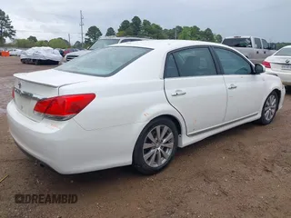 2011 Toyota Avalon with VIN 4T1BK3DB1BU405730, listed as a IAAI auction lot 41895757 with 214,655 mi miles and . Bid and sale history available at carsss.com. Image 4.