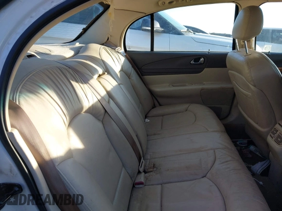 2001 Lincoln Continental with VIN 1LNHM97V71Y670611, listed as a IAAI auction lot 41385621 with 141,714 mi miles. Bid and sale history available at carsss.com. Image 8.