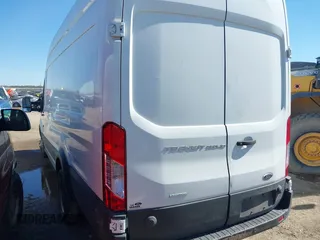 2019 Ford Transit Cargo with VIN 1FTBF4XG4KKB77790, listed as a IAAI auction lot 41711746 with 198,739 mi miles. Bid and sale history available at carsss.com. Image 3.