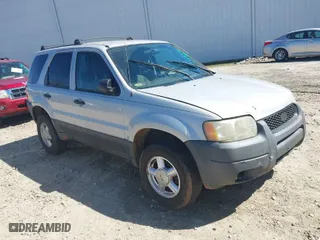 2003 Ford Escape XLT Popular with VIN 1FMYU03103KC87839, listed as a IAAI auction lot 41831997 with 241,204 mi miles. Bid and sale history available at carsss.com. Image 1.