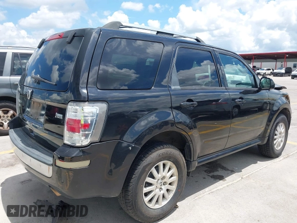 2011 Mercury Mariner Premier with VIN 4M2CN8HGXBKJ07489, listed as a IAAI auction lot 42574942 with 163,786 mi miles and . Bid and sale history available at DreamBid. Image 4.