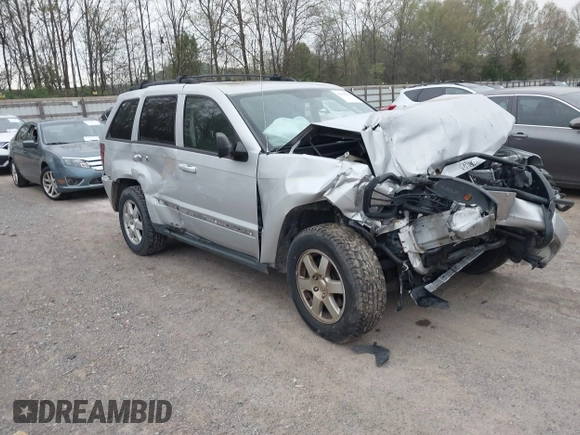 2009 Jeep Grand Cherokee Laredo with VIN 1J8GR48K09C557139, listed as a IAAI auction lot 41994604 with 1 mi miles. Bid and sale history available at carsss.com. Image 1.