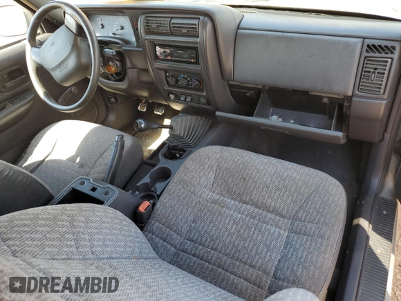 2000 Jeep Cherokee SE with VIN 1J4FT27P6YL127419, listed as a Copart auction lot 74211284 with 199,078 mi miles and Clean title. Bid and sale history available at DreamBid. Image 8.