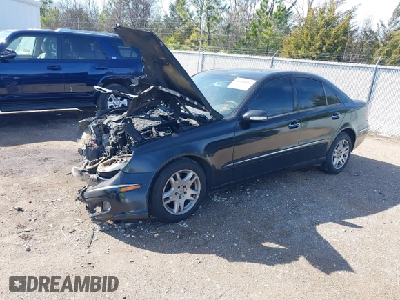 2005 Mercedes-Benz E-Class 3.2L with VIN WDBUF65J65A695704, listed as a IAAI auction lot 41618041 with 1 mi miles. Bid and sale history available at carsss.com. Image 2.