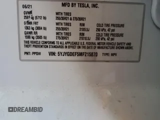 2021 Tesla Model Y Performance z VIN 5YJYGDEF5MF215870, wystawiony jako Copart lot #52531015 z przebiegiem 21 904 mil mil oraz Szkoda całkowita • Salvage title. Historia ofert i sprzedaży dostępna na DreamBid. Obrazek 12.
