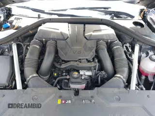 2022 Genesis GV70 Sport z VIN KMUMCDTC3NU074029, wystawiony jako IAAI lot #41400987 z przebiegiem 29 494 mil mil oraz . Historia ofert i sprzedaży dostępna na DreamBid. Obrazek 10.