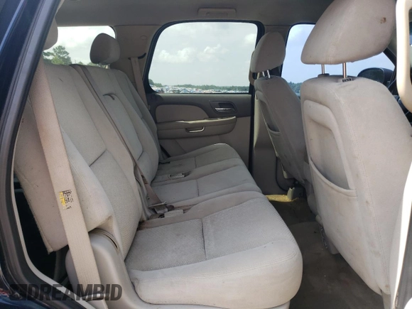 2007 Chevrolet Tahoe LT z VIN 1GNFC13JX7R114712, wystawiony jako Copart lot #62892205 z przebiegiem 295 890 mil mil oraz Szkoda całkowita • Salvage title. Historia ofert i sprzedaży dostępna na DreamBid. Obrazek 11.
