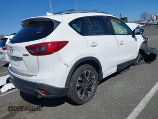 2016 Mazda CX-5 Grand Touring with VIN JM3KE4DY9G0706192, listed as a IAAI auction lot 41824828 with Not Provided miles and . Bid and sale history available at DreamBid. Image 4.