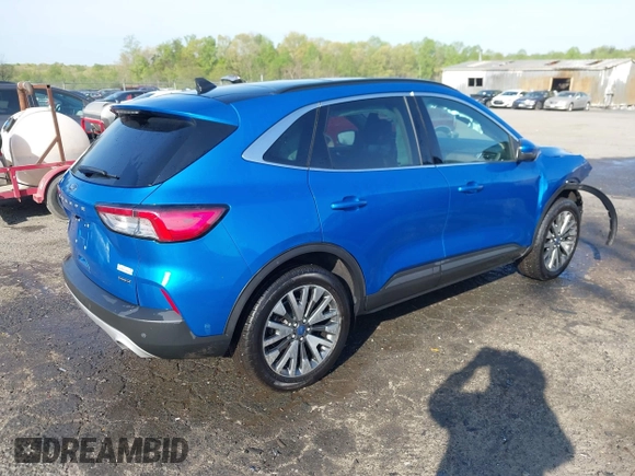2020 Ford Escape Titanium Hybrid with VIN 1FMCU9DZ1LUB59214, listed as a IAAI auction lot 42050336 with 59,547 mi miles and . Bid and sale history available at DreamBid. Image 4.