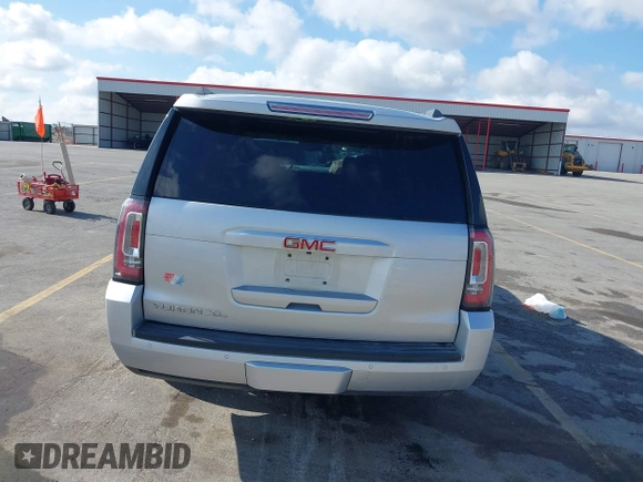 2015 GMC Yukon XL SLT z VIN 1GKS2HKCXFR618783, wystawiony jako IAAI lot #42081053 z przebiegiem 230 368 mil mil oraz . Historia ofert i sprzedaży dostępna na DreamBid. Obrazek 17.