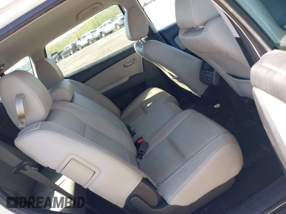 2015 Mazda CX-9 Touring with VIN JM3TB3CV1F0461403, listed as a IAAI auction lot 42148325 with 143,452 mi miles. Bid and sale history available at carsss.com. Image 8.
