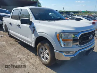 2021 Ford F-150 XL z VIN 1FTFW1E58MFB95884, wystawiony jako IAAI lot #42228660 z przebiegiem 84 791 mil mil oraz . Historia ofert i sprzedaży dostępna na DreamBid. Obrazek 1.
