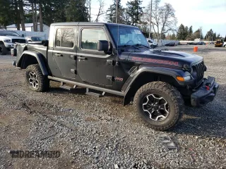 2021 Jeep Gladiator Rubicon with VIN 1C6JJTBG5ML500423, listed as a Copart auction lot 46954765 with 82,483 mi miles and Salvage title. Bid and sale history available at DreamBid. Image 4.