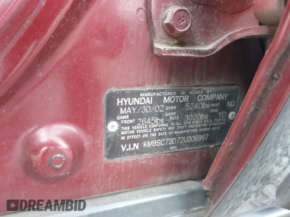 2002 Hyundai Santa Fe GLS with VIN KM8SC73D72U306997, listed as a IAAI auction lot 41519773 with 244,398 mi miles. Bid and sale history available at carsss.com. Image 9.