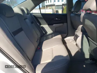 2014 Toyota Camry L with VIN 4T4BF1FK8ER397268, listed as a Copart auction lot 52114735 with 122,210 mi miles and Clean Title. Bid and sale history available at DreamBid. Image 10.