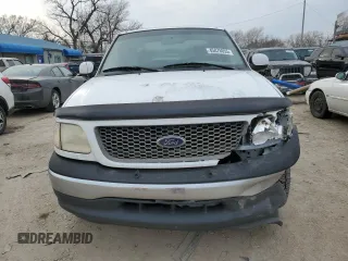 2001 Ford F-150 XL z VIN 1FTRX17W81NA56565, wystawiony jako Copart lot #45876055 z przebiegiem 241 522 mil mil oraz Szkoda całkowita • Salvage title. Historia ofert i sprzedaży dostępna na DreamBid. Obrazek 5.