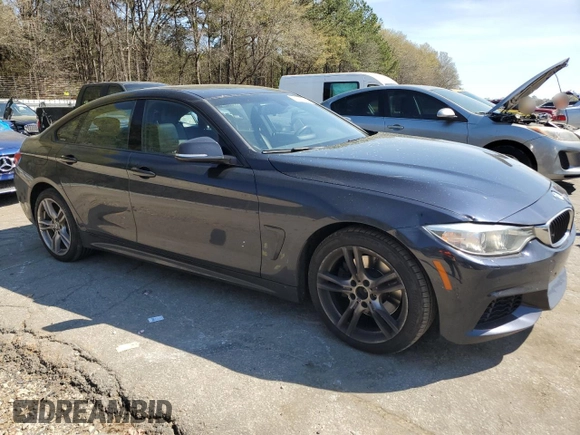 2015 BMW 4 Series 428i xDrive with VIN WBA4A7C58FD413734, listed as a Copart auction lot 50252325 with 74,629 mi miles and Salvage title. Bid and sale history available at DreamBid. Image 4.