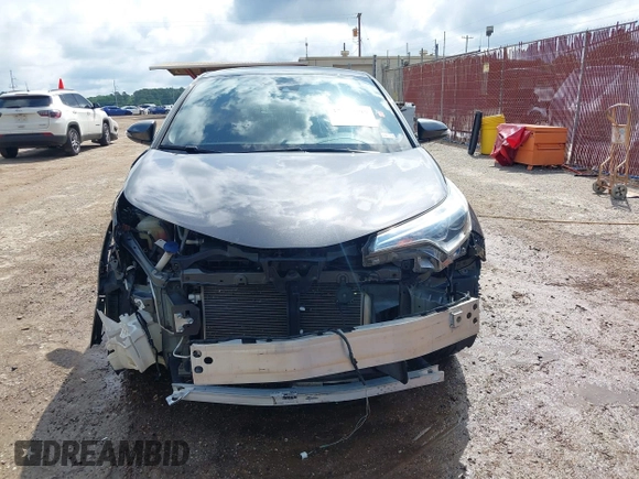 2018 Toyota C-HR XLE z VIN NMTKHMBX5JR045242, wystawiony jako IAAI lot #42209395 z przebiegiem 78 755 mil mil oraz . Historia ofert i sprzedaży dostępna na DreamBid. Obrazek 13.