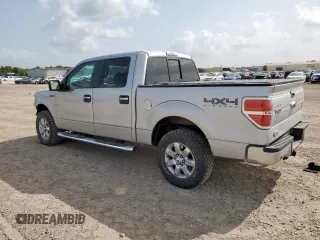 2014 Ford F-150 XL with VIN 1FTFW1ET0EKG04449, listed as a Copart auction lot 62642725 with 223,472 mi miles and Salvage title. Bid and sale history available at DreamBid. Image 2.