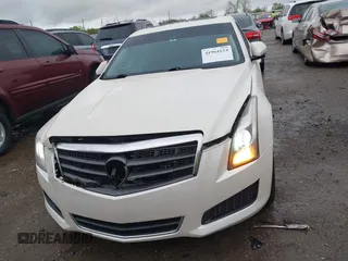 2013 Cadillac ATS z VIN 1G6AA5RX9D0156125, wystawiony jako IAAI lot #41964124 z przebiegiem 139 869 mil mil oraz . Historia ofert i sprzedaży dostępna na DreamBid. Obrazek 11.