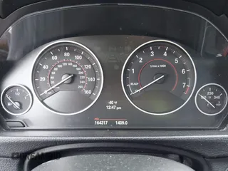 2012 BMW 3 Series 328i with VIN WBA3A5C56CF259220, listed as a IAAI auction lot 41833520 with 164,317 mi miles. Bid and sale history available at carsss.com. Image 7.