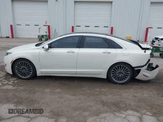 2013 Lincoln MKZ z VIN 3LN6L2GK9DR811737, wystawiony jako IAAI lot #42011896 z przebiegiem 100 669 mil mil oraz . Historia ofert i sprzedaży dostępna na DreamBid. Obrazek 15.