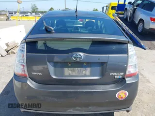 2007 Toyota Prius z VIN JTDKB20UX73217307, wystawiony jako IAAI lot #42225740 z przebiegiem 196 251 mil mil oraz . Historia ofert i sprzedaży dostępna na DreamBid. Obrazek 16.