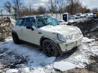 2002 MINI Hardtop with VIN WMWRC334X2TC38342, listed as a Copart auction lot 45706475 with 107,735 mi miles and Salvage Title. Bid and sale history available at DreamBid. Image 4.