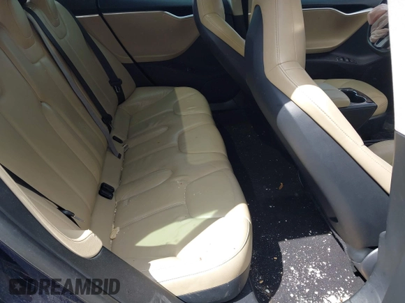 2014 Tesla Model S 60 with VIN 5YJSA1H15EFP43884, listed as a IAAI auction lot 41993180 with 78,305 mi miles and . Bid and sale history available at DreamBid. Image 8.
