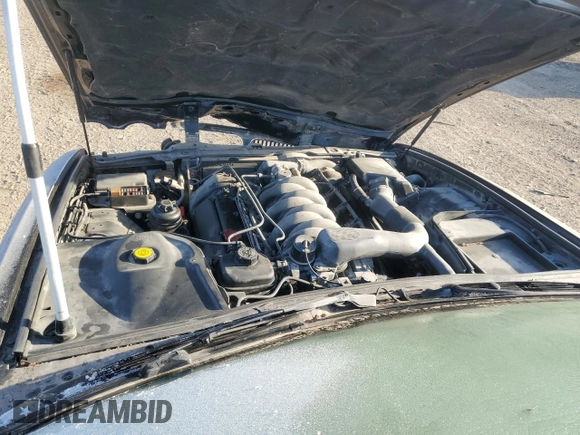 1998 Jaguar XJ with VIN SAJHX1245WC819762, listed as a Copart auction lot 81480174 with 132,491 mi miles and Salvage title. Bid and sale history available at DreamBid. Image 12.