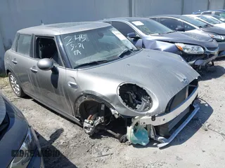 2019 MINI Hardtop 4 Door Cooper with VIN WMWXU1C59K2L24715, listed as a IAAI auction lot 41398540 with 6,052 mi miles and . Bid and sale history available at DreamBid. Image 1.