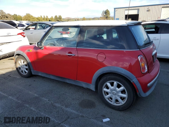 2004 MINI Hardtop with VIN WMWRC33474TJ53569, listed as a Copart auction lot 72429454 with 154,713 mi miles and Salvage Title. Bid and sale history available at DreamBid. Image 2.
