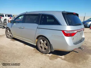 2013 Honda Odyssey Touring with VIN 5FNRL5H93DB076463, listed as a IAAI auction lot 41819994 with 188,911 mi miles. Bid and sale history available at carsss.com. Image 3.