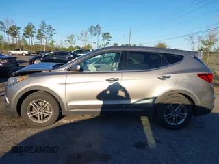 2018 Hyundai Santa Fe 2.4L z VIN 5NMZTDLB8JH098926, wystawiony jako IAAI lot #41816513 z przebiegiem 92 920 mil mil oraz . Historia ofert i sprzedaży dostępna na DreamBid. Obrazek 15.