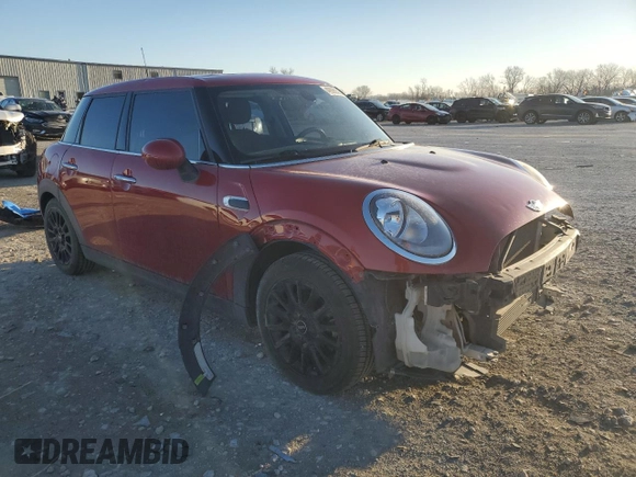2016 MINI Hardtop 4 Door with VIN WMWXU1C59G2D09996, listed as a Copart auction lot 49085325 with 119,806 mi miles and Salvage title. Bid and sale history available at DreamBid. Image 4.